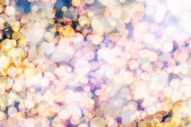 Bokeh ışıkları ve yıldız desenli şenlikli soyut arkaplan