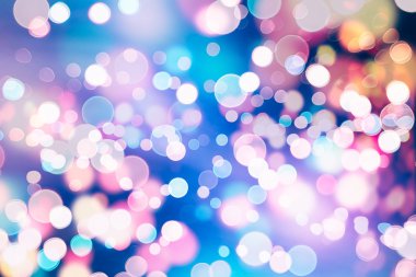 Bokeh ışıkları ve yıldız desenli şenlikli soyut arkaplan