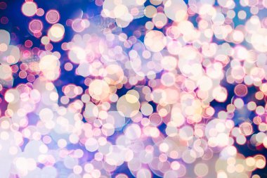 Bokeh ışıkları ve yıldız desenli şenlikli soyut arkaplan