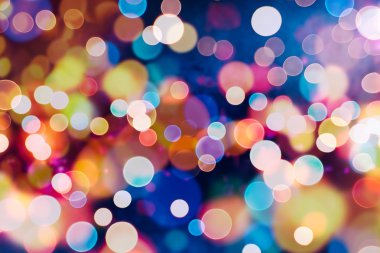 Bokeh ışıkları ve yıldız desenli şenlikli soyut arkaplan