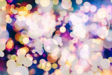 Bokeh ışıkları ve yıldız desenli şenlikli soyut arkaplan