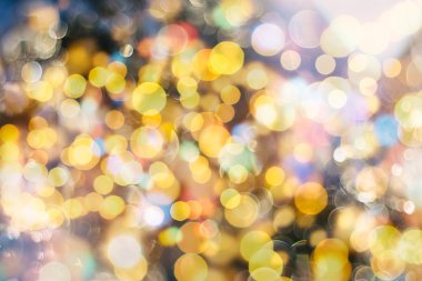 Bokeh ışıkları ve yıldız desenli şenlikli soyut arkaplan