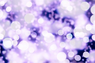 Bokeh ışıkları ve yıldız desenli şenlikli soyut arkaplan