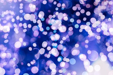 Bokeh ışıkları ve yıldız desenli şenlikli soyut arkaplan