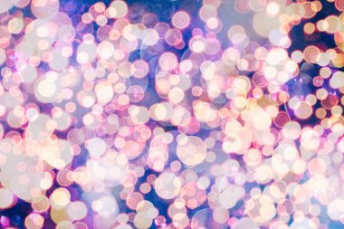 Bokeh ışıkları ve yıldız desenli şenlikli soyut arkaplan