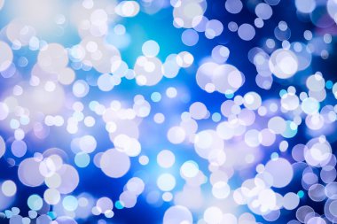 Bokeh ışıkları ve yıldız desenli şenlikli soyut arkaplan