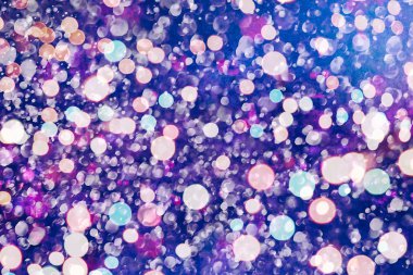 Bokeh ışıkları ve yıldız desenli şenlikli soyut arkaplan