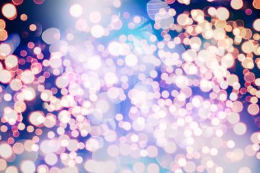 Bokeh ışıkları ve yıldız desenli şenlikli soyut arkaplan