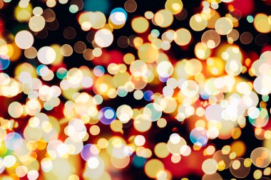 Bokeh ışıkları ve yıldız desenli şenlikli soyut arkaplan