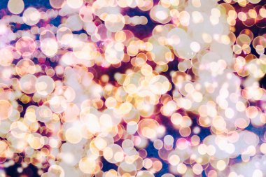 Bokeh ışıkları ve yıldız desenli şenlikli soyut arkaplan