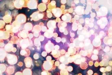 Bokeh ışıkları ve yıldız desenli şenlikli soyut arkaplan