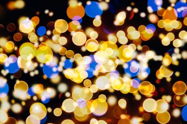 Bokeh ışıkları ve yıldız desenli şenlikli soyut arkaplan