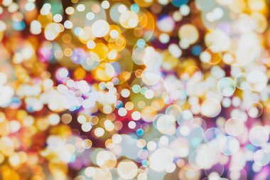 Bokeh ışıkları ve yıldız desenli şenlikli soyut arkaplan