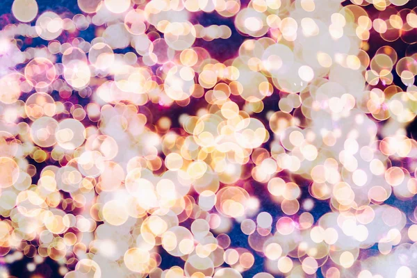 Bokeh ışıkları ve yıldız desenli şenlikli soyut arkaplan