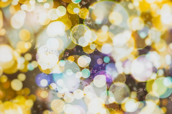 Feestelijke elegante abstracte achtergrond met bokeh lichten en sterren textuur — Stockfoto