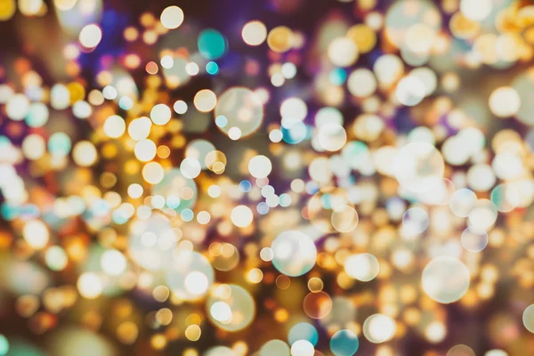 Fundo abstrato com bokeh desfocado luzes e estrelas — Fotografia de Stock