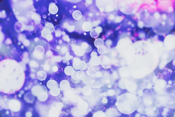 Fundo abstrato com bokeh desfocado luzes e estrelas — Fotografia de Stock