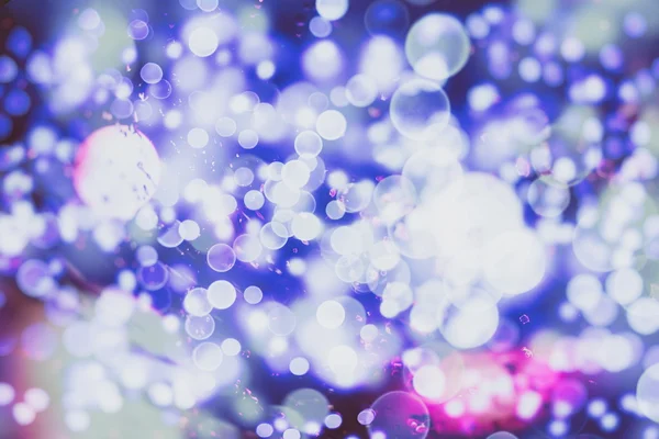 Fondo abstracto con luces y estrellas bokeh desenfocadas — Foto de Stock