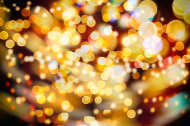 Doğal Bokeh ve parlak altın ışık şenlikli arka plan. Vintage sihirli arka plan rengi ile