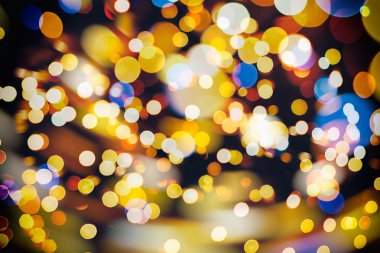 Doğal Bokeh ve parlak altın ışık şenlikli arka plan. Vintage sihirli arka plan rengi ile