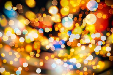 Doğal Bokeh ve parlak altın ışık şenlikli arka plan. Vintage sihirli arka plan rengi ile