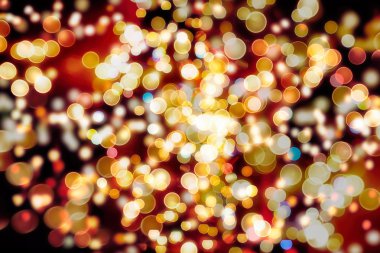 Doğal Bokeh ve parlak altın ışık şenlikli arka plan. Vintage sihirli arka plan rengi ile