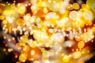 Doğal Bokeh ve parlak altın ışık şenlikli arka plan. Vintage sihirli arka plan rengi ile
