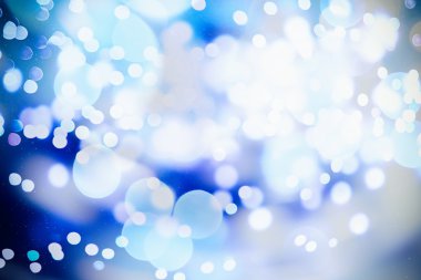 Doğal Bokeh ve parlak altın ışık şenlikli arka plan. Vintage sihirli arka plan rengi ile