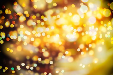 Doğal Bokeh ve parlak altın ışık şenlikli arka plan. Vintage sihirli arka plan rengi ile