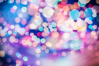 Bokeh ışıkları ve yıldız desenli şenlikli soyut arkaplan