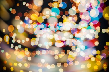 Bokeh ışıkları ve yıldız desenli şenlikli soyut arkaplan