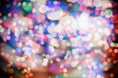 Bokeh ışıkları ve yıldız desenli şenlikli soyut arkaplan