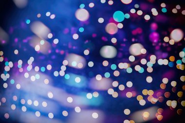 Bokeh ışıkları ve yıldız desenli şenlikli soyut arkaplan