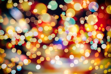 Bokeh ışıkları ve yıldız desenli şenlikli soyut arkaplan