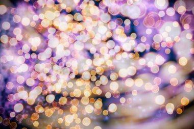 Bokeh ışıkları ve yıldız desenli şenlikli soyut arkaplan