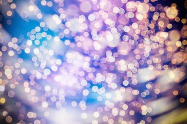 Bokeh ışıkları ve yıldız desenli şenlikli soyut arkaplan