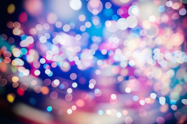 Bokeh ışıkları ve yıldız desenli şenlikli soyut arkaplan