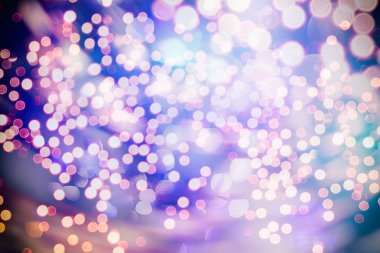Bokeh ışıkları ve yıldız desenli şenlikli soyut arkaplan