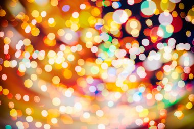 Bokeh ışıkları ve yıldız desenli şenlikli soyut arkaplan