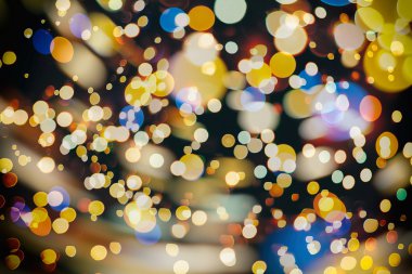 Bokeh ışıkları ve yıldız desenli şenlikli soyut arkaplan