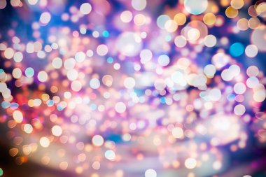 Bokeh ışıkları ve yıldız desenli şenlikli soyut arkaplan