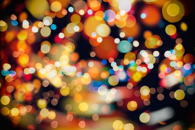 Bokeh ışıkları ve yıldız desenli şenlikli soyut arkaplan