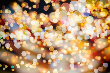 Bokeh ışıkları ve yıldız desenli şenlikli soyut arkaplan