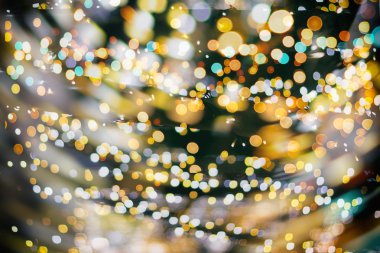 Bokeh ışıkları ve yıldız desenli şenlikli soyut arkaplan