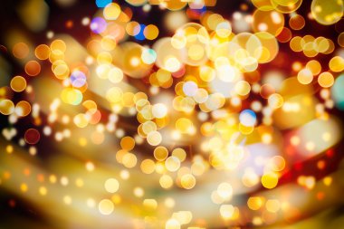 Bokeh ışıkları ve yıldız desenli şenlikli soyut arkaplan