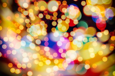 Bokeh ışıkları ve yıldız desenli şenlikli soyut arkaplan