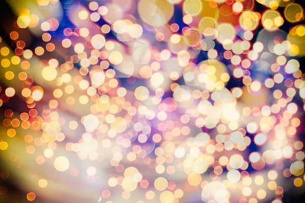 Festlicher Hintergrund mit natürlichem Bokeh und leuchtend goldenen Lichtern. Vintage magischen Hintergrund mit Farbe — Stockfoto