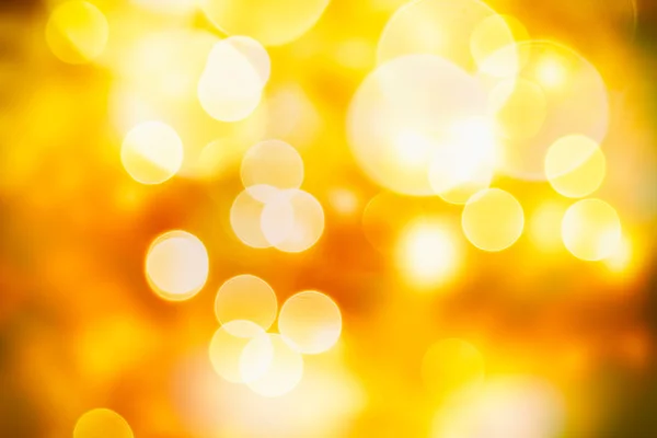 Festlicher Hintergrund mit natürlichem Bokeh und leuchtend goldenen Lichtern. Vintage magischen Hintergrund mit Farbe — Stockfoto