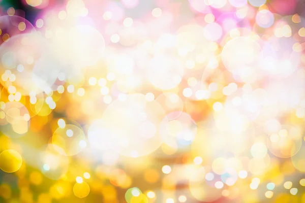 Festlicher Hintergrund mit natürlichem Bokeh und leuchtend goldenen Lichtern. Vintage magischen Hintergrund mit Farbe — Stockfoto