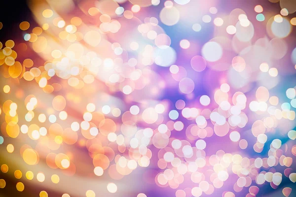 Feestelijke achtergrond met natuurlijke Bokeh en felle gouden lichten. Vintage magische achtergrond met kleur — Stockfoto